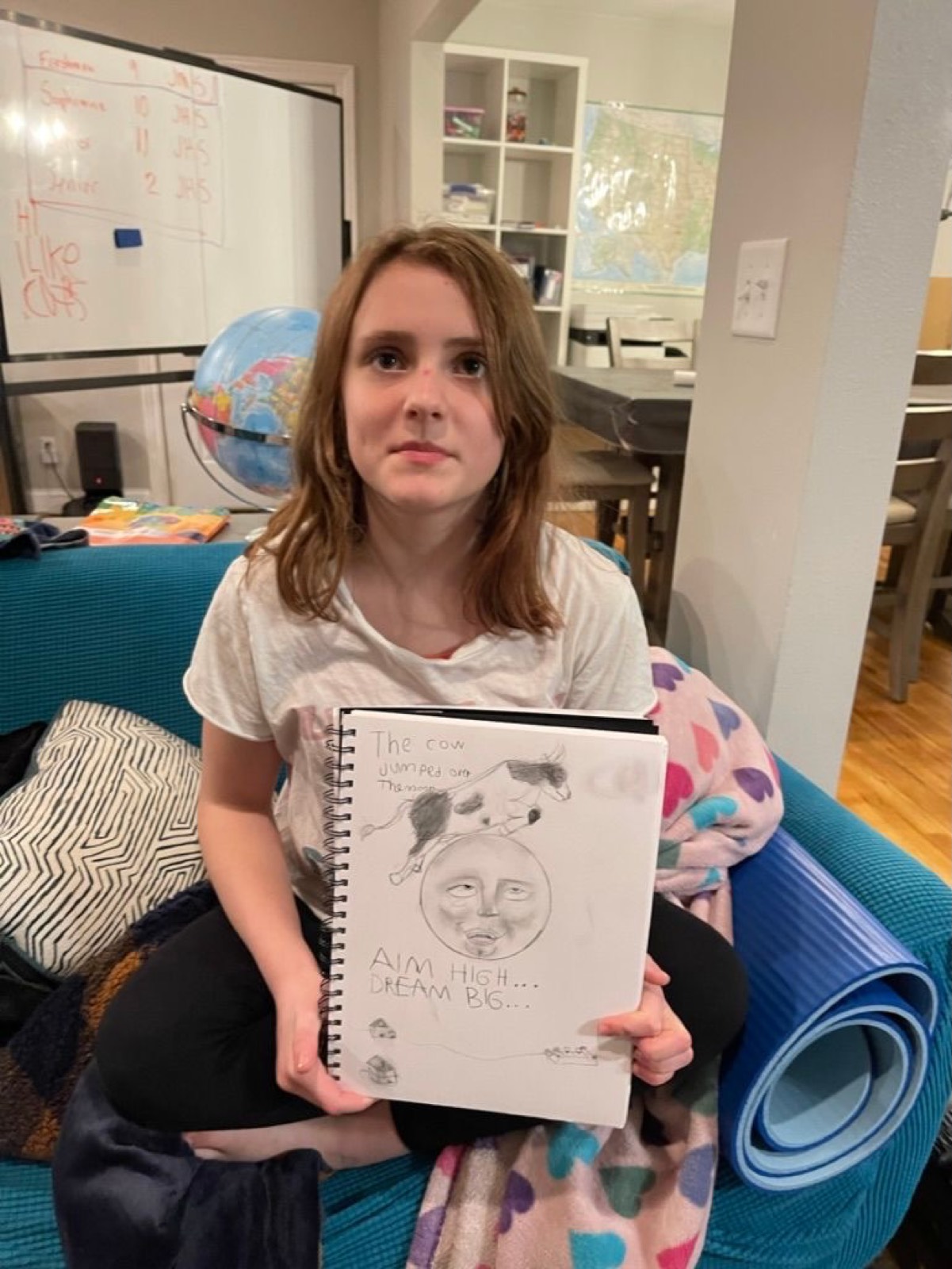 Brigetta is working on a submission for a school poster contest.